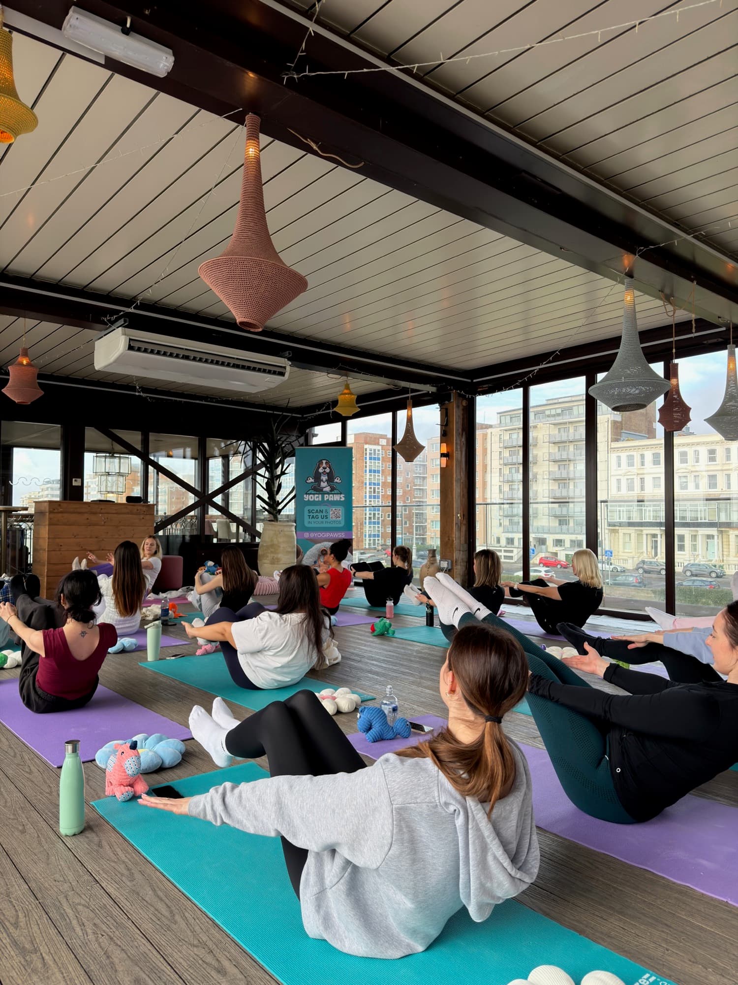 A Yogi Paws puppy yoga class in session