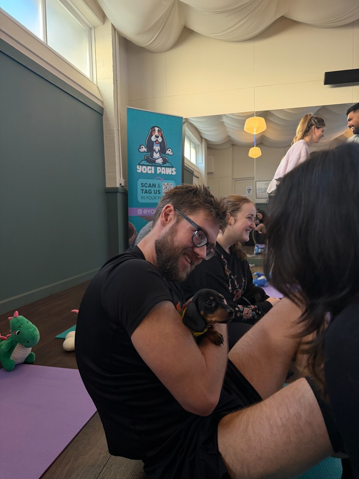A Yogi Paws puppy yoga class in session