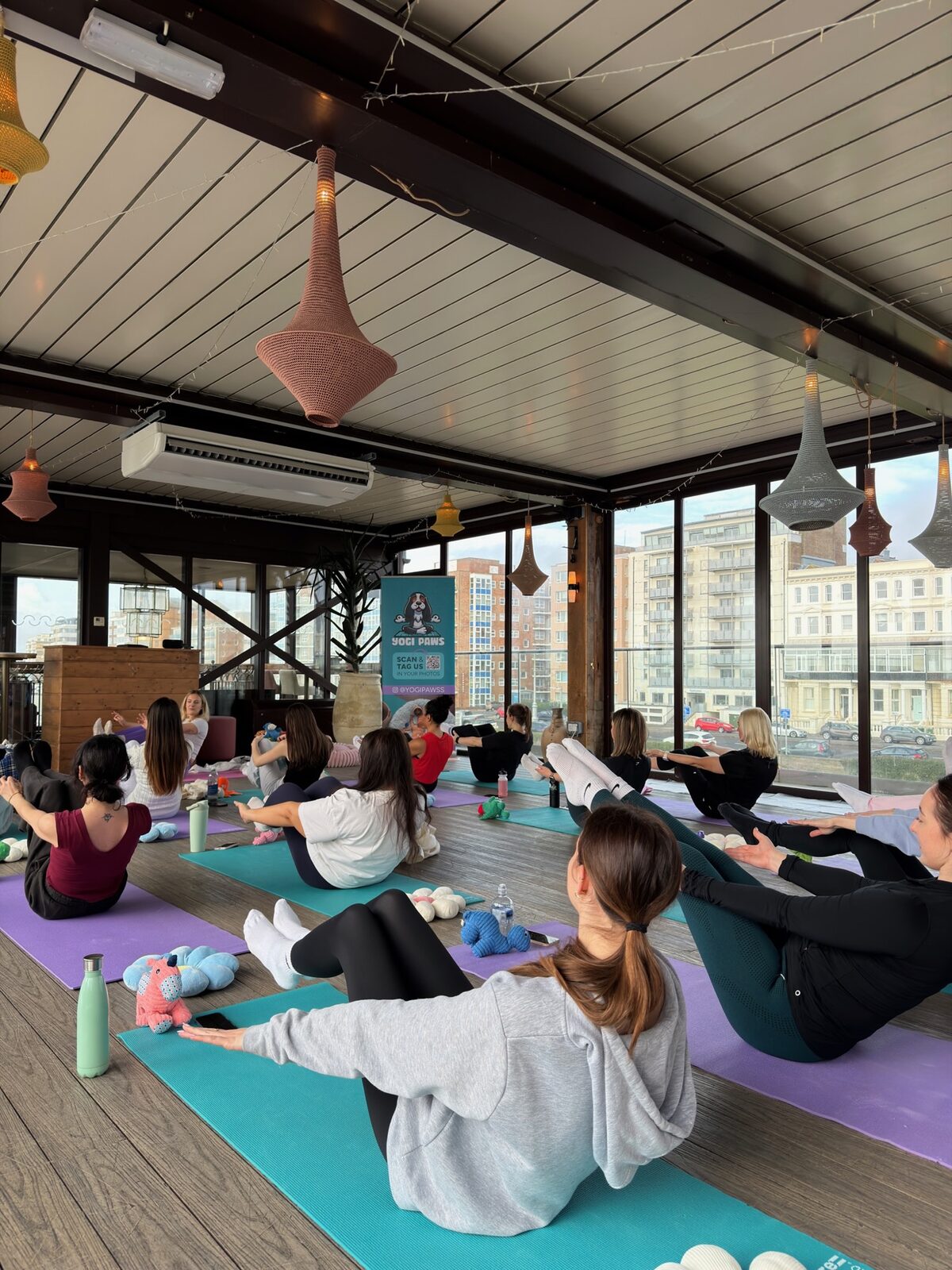 A Yogi Paws puppy yoga class in session